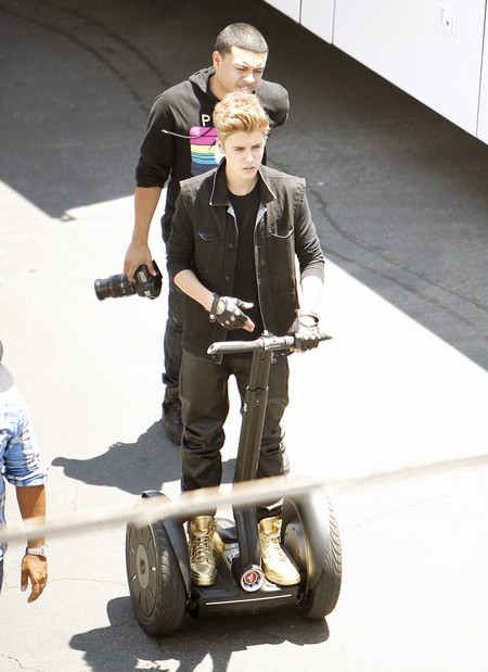 Exclusive Pics! Justin Bieber Almost Falls Over A Plant!