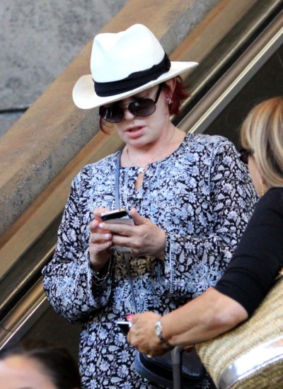 Plastic Surgery Gone Bad? Sharon Osbourne Covers Up Patchy Hairline