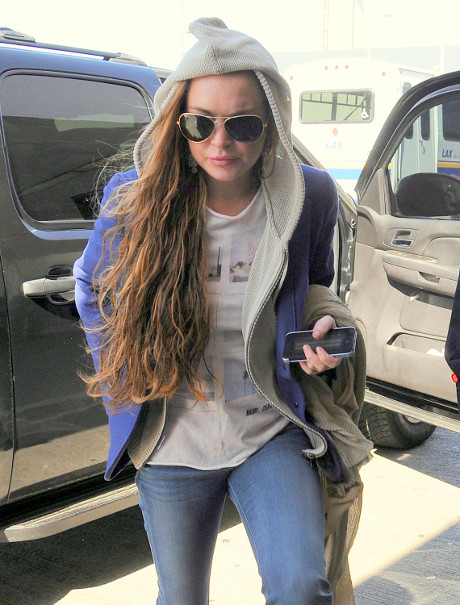 Lindsay Lohan Back To Hardcore Partying and Scandalous Ways in NYC — Spotted With New Man at Club Raven!