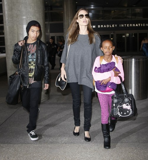 Angelina Jolie, Ryan Reynolds, Tom Cruise All Call Paparazzi To Create Public Image