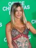 Jennifer Aniston Fuels Pregnancy Reports, Rubs Alleged Baby Bump During ‘Christmas Party’ Red Carpet Event