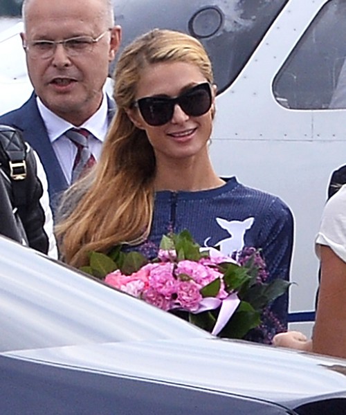 Paris Hilton Arrives in Poland for Polish Fashion Week Looking Gorgeous – DJ’ing Gig to Showcase Amazing Skills (PHOTOS)