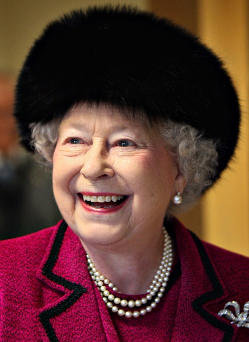 Pamela Anderson Slams Queen Elizabeth Over Black Bear Fur Hat Controversy