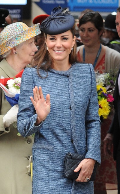 Kate Middleton Reveals New Baby Bump In Old Coat